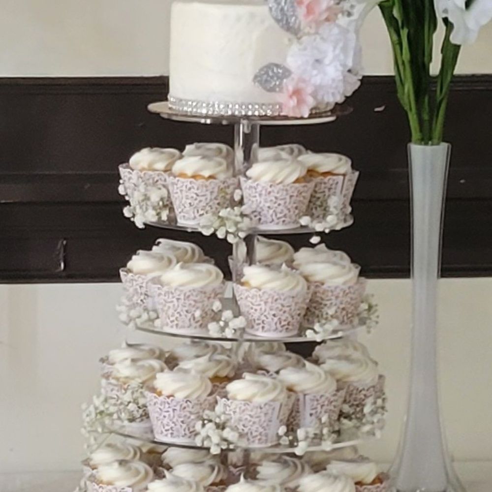 McCrum's Bakery - Cupcake tower with 6 in round 3 layer cake on top! - Desserts Near Me - Elmwood Park, New Jersey