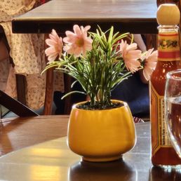 Cute flowers on one of the tables. Cute flowers on one of the tables.