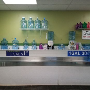 Good Water - bottles of water on a counter - Grocery Near Me - South Gate, California Good Water - bottles of water on a counter - Grocery Near Me - South Gate, California