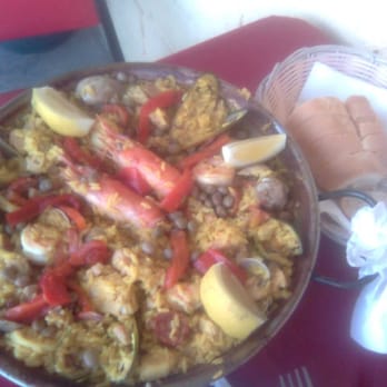 Spain Restaurant - Paella with seafood, chicken, and sausage - Spanish Near Me - Los Angeles, California Spain Restaurant - Paella with seafood, chicken, and sausage - Spanish Near Me - Los Angeles, California