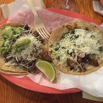 Flaco's Tacos - Cowboy taco on left, steak taco on right - Mexican Near Me - Chicago, Illinois