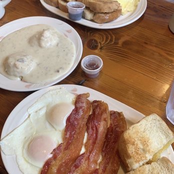 Toni's Diner - 2 eggs over-easy with bacon, white toast, side of sausage gravy over biscuits. Ham pepper and onion omelet with wheat toast. - American Near Me - Hector, New York