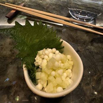 Coral Omakase - a bowl of food and chopsticks - Sushi Bars Near Me - New York, New York
