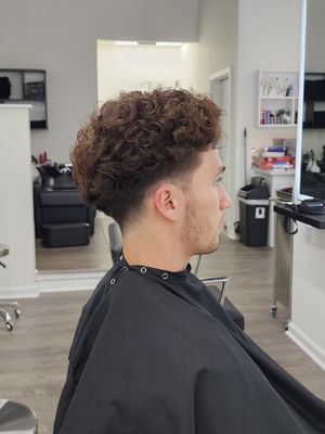Men's - A collection of expertly styled men's cuts and grooming. From classic fades to modern textured looks, each cut is tailored to suit individual style and personality. Whether it's a sharp, professional finish or a relaxed, effortless look, our portfolio showcases precision and attention to detail. Get inspired for your next haircut!" Men's - A collection of expertly styled men's cuts and grooming. From classic fades to modern textured looks, each cut is tailored to suit individual style and personality. Whether it's a sharp, professional finish or a relaxed, effortless look, our portfolio showcases precision and attention to detail. Get inspired for your next haircut!"