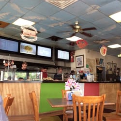 Anthony's Pizza Palace - Inside counter at lunch.. Busy bee's