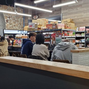 Hanamaru Japanese Mart - View from the food court towards the front of the store. Small play area is on the right (shoes must be off). - International Grocery Near Me - Syosset, New York Hanamaru Japanese Mart - View from the food court towards the front of the store. Small play area is on the right (shoes must be off). - International Grocery Near Me - Syosset, New York