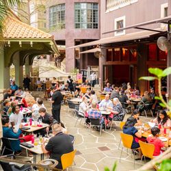 Acenar Mexican Restaurant - Guests enjoying the view from Acenar's patio overlooking the San Antonio Riverwalk.