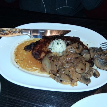 Double Cut Steak House - 14 oz Ribeye Steak $59. Mushrooms and onion add on $5. Hubby enjoyed it. - Steakhouses Near Me - Wisconsin Dells, Wisconsin