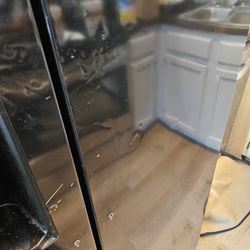 Love's Moving Service - Refrigerator dents and scratches front