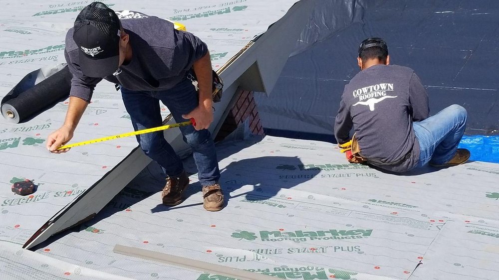 Slide of Cowtown Roofing