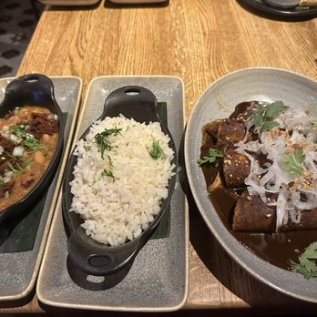 Frontera Grill - Enchiladas with Mole,  White Rice and Pinto Beans with bacon and chorizo. - Mexican Near Me - Chicago, Illinois