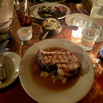 Fore Street - Turnspit Roasted Dry Rubbed Pork Loin ($32), Garlic Mashed Potatoes ($8), and in background the Pineland Farm Hanger Steak ($36) - New American Near Me - Portland, Maine Fore Street - Turnspit Roasted Dry Rubbed Pork Loin ($32), Garlic Mashed Potatoes ($8), and in background the Pineland Farm Hanger Steak ($36) - New American Near Me - Portland, Maine