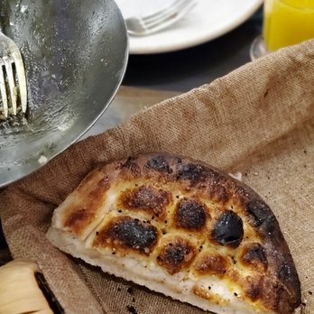 Finjan - a slice of pizza on a plate - Middle Eastern Near Me - Oakville, Ontario Finjan - a slice of pizza on a plate - Middle Eastern Near Me - Oakville, Ontario