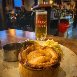 Goat Tavern - Steak and ale pie, mash, cabbage, and gravy. Also, a pint of Flint Eye.