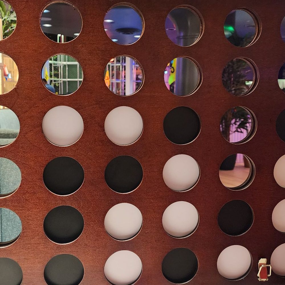Holey Moley - Giant connect 4 - Mini Golf Near Me - Houston, Texas