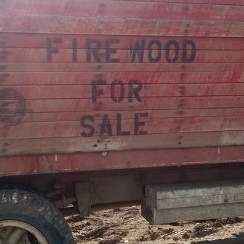 Accomplished Ones - a red truck with the words firewood for sale written on it - Landscaping Near Me Accomplished Ones - a red truck with the words firewood for sale written on it - Landscaping Near Me