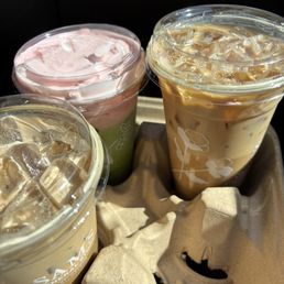 Iced white mocha, iced vanilla chai latte and iced strawberry matcha with strawberry cold foam.