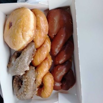 Tasty Cream Donuts - Glaze Blueberry Cake Donut, Strawberry filled donut and regular and chocolate twist - Donuts Near Me - Westwego, Louisiana Tasty Cream Donuts - Glaze Blueberry Cake Donut, Strawberry filled donut and regular and chocolate twist - Donuts Near Me - Westwego, Louisiana