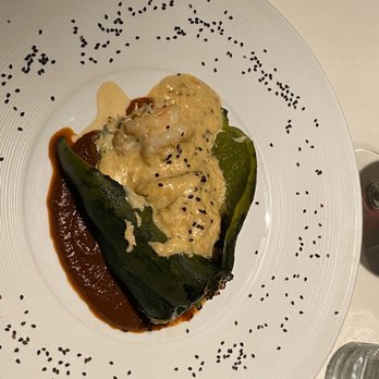 Bistro Teresa - Stuffed Chile Poblano with Crab and Shrimp. Good flavor, well cooked, a tad salty. My wife's Seabass exhibited the same good and bad. - Bistros Near Me - Puerto Vallarta, JAL Bistro Teresa - Stuffed Chile Poblano with Crab and Shrimp. Good flavor, well cooked, a tad salty. My wife's Seabass exhibited the same good and bad. - Bistros Near Me - Puerto Vallarta, JAL