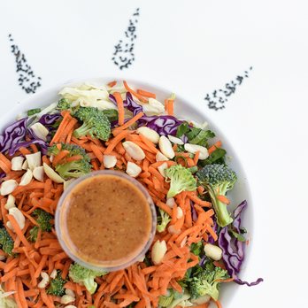 Rappit Up! - a bowl of salad with dressing - Vegan Near Me - Fresno, California