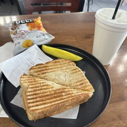 Waverly Cafe - Grilled cheese with side of chips and pickle. Lemonade to drink.