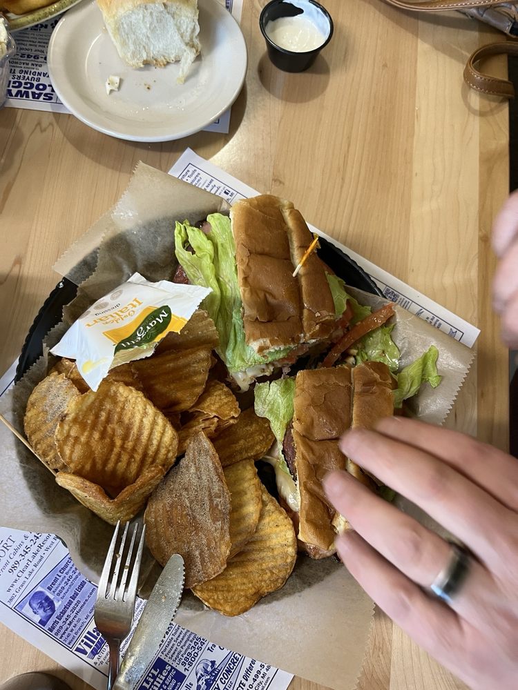 Sunrise Cafe and Cabins Logo