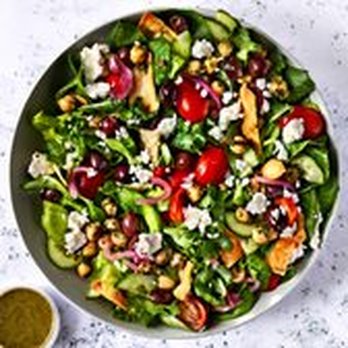Royal Greens - a bowl of salad with dressing - Salad Near Me - Westfield, New Jersey Royal Greens - a bowl of salad with dressing - Salad Near Me - Westfield, New Jersey