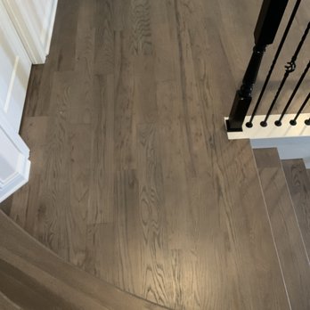 Four L Flooring & Renovations - a staircase in a home - Flooring Near Me