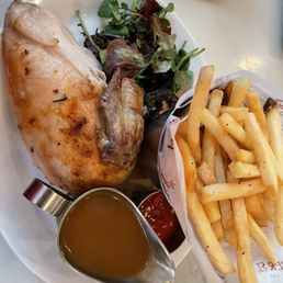 1/4 white meat chicken with fries and a salad