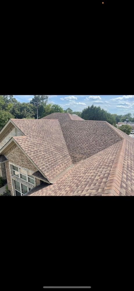 Slide of Top Dawg Roofing