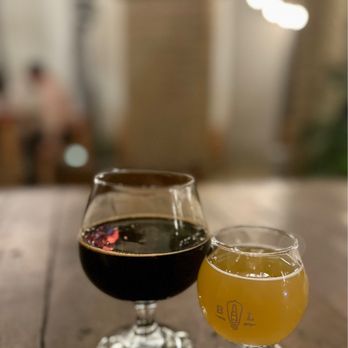 Bottle Logic Brewing - two glasses of beer on a table - Breweries Near Me - Anaheim, California