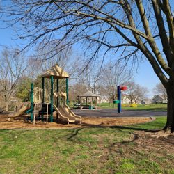 Small playground, basketball hoop, gazebo