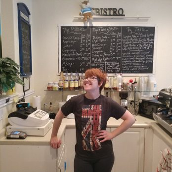 Blue Fox Coffeehouse - a woman standing in front of the counter - Coffee & Tea Near Me - Cavalier, North Dakota Blue Fox Coffeehouse - a woman standing in front of the counter - Coffee & Tea Near Me - Cavalier, North Dakota