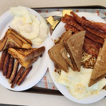 Nation's Giant Hamburgers - EXTRA GIANT THREE-EGGER (2 total). One with bacon and toast, the other with sausage and French toast. - Burgers Near Me - Modesto, California