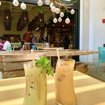 Our Spot Coffee & Goods - The Origin Story (right) paired with a classic Matcha Latte. - Coffee & Tea Near Me - Long Beach, California
