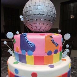 Doug's Roll-A-Rink - One of the most elaborate cakes over over the years. Wow....what an artist!