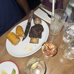 Beef rib with corn and a slaw of some type I can't remember..my brother said it was delicious