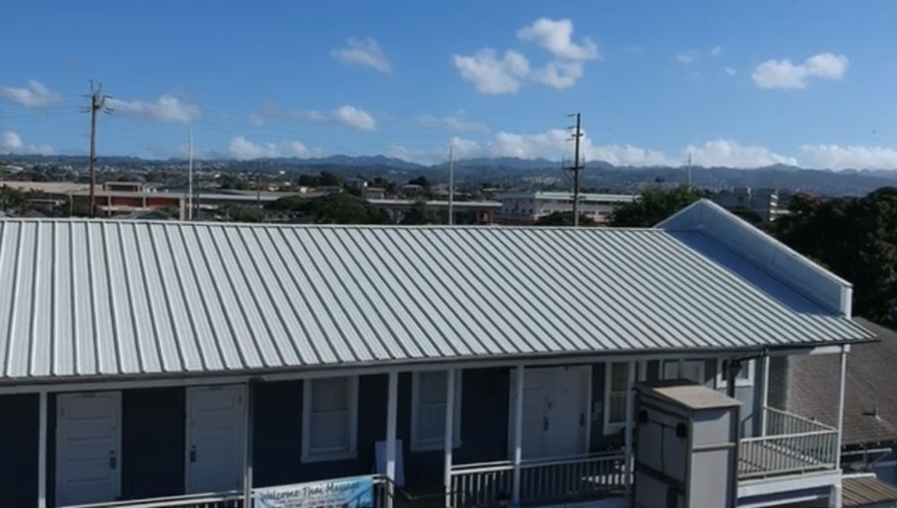 Slide of First Class Roofing