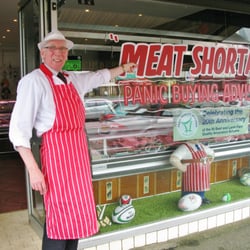 Murphys Quality Meat Specialist - Happy butcher ... warning that there's a "Meat Shortage" so "Panic Buying Advised"!  Like it.