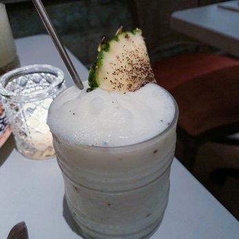 Mariel - Pina colada has a unique and tasty touch, they mix in coffee grounds! - Cuban Near Me - Boston, Massachusetts Mariel - Pina colada has a unique and tasty touch, they mix in coffee grounds! - Cuban Near Me - Boston, Massachusetts