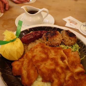 Andechser am Dom - Everything I wanted.  Veal Schnizel, veal meat ball with cabbage and waygu beef sausage - Beer Bar Near Me - Munich, BY