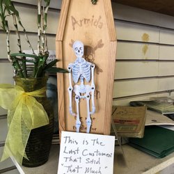 Holmes Shoe Repair - Funny sign in shoe repair shop