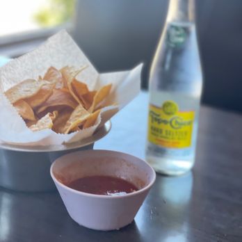 La Morenita - a bowl of chips and a bottle of water - Mexican Near Me - Livingston, California La Morenita - a bowl of chips and a bottle of water - Mexican Near Me - Livingston, California