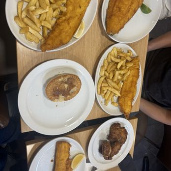 Laughing Halibut - Our spread - Fish & Chips Near Me - London, XGL Laughing Halibut - Our spread - Fish & Chips Near Me - London, XGL