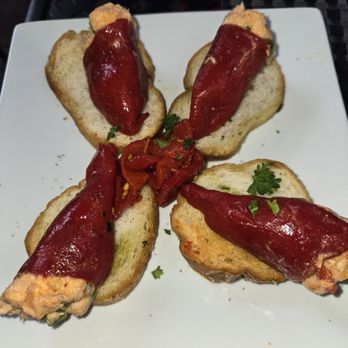 España Restaurant & Tapas - Piquillo stuffed pepper with smoked salmon and served on crustini - Spanish Near Me - Fernandina Beach, Florida España Restaurant & Tapas - Piquillo stuffed pepper with smoked salmon and served on crustini - Spanish Near Me - Fernandina Beach, Florida
