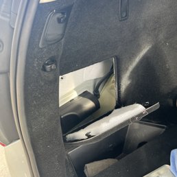 left open compartment in hatch area.
