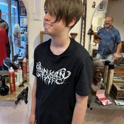 Dubhe Hairdressers - This kid loves Enzo's creation! Such a cool hair cut !