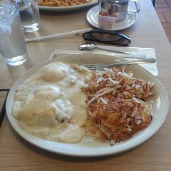 Raul's Striper Cafe - Egg's benedict swimming in white gravy and hashbrowns - Breakfast & Brunch Near Me - Rio vista, California Raul's Striper Cafe - Egg's benedict swimming in white gravy and hashbrowns - Breakfast & Brunch Near Me - Rio vista, California