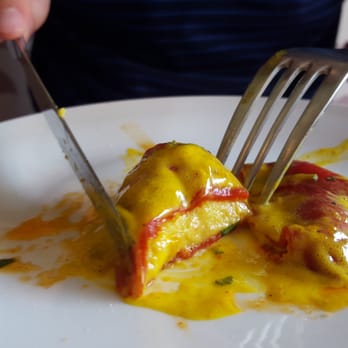 La Vinia - Piquillo peppers stuffed with seafood mouse and slathered in an anise cream. - Spanish Near Me - Toronto, Ontario