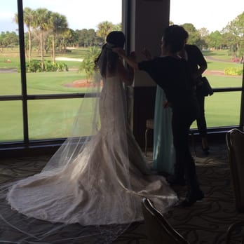 Element Hair Studio - Jessica helping the bride get ready to walk down the aisle! - Hair Salons Near Me - Tampa, Florida Element Hair Studio - Jessica helping the bride get ready to walk down the aisle! - Hair Salons Near Me - Tampa, Florida